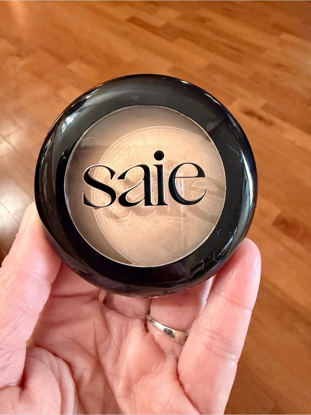 Saie translucent setting powder-2 light to medium.